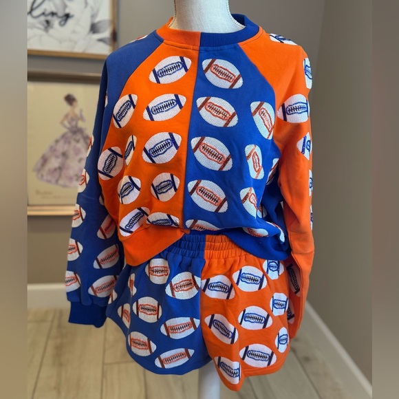 QUEEN OF SPARKLES Tops - New!QUEEN OF SPARKLES Blue & Orange Sequin Football Sweatshirt & Shorts Set